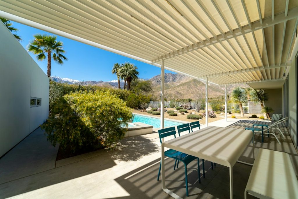 Covered patio with table and chairs