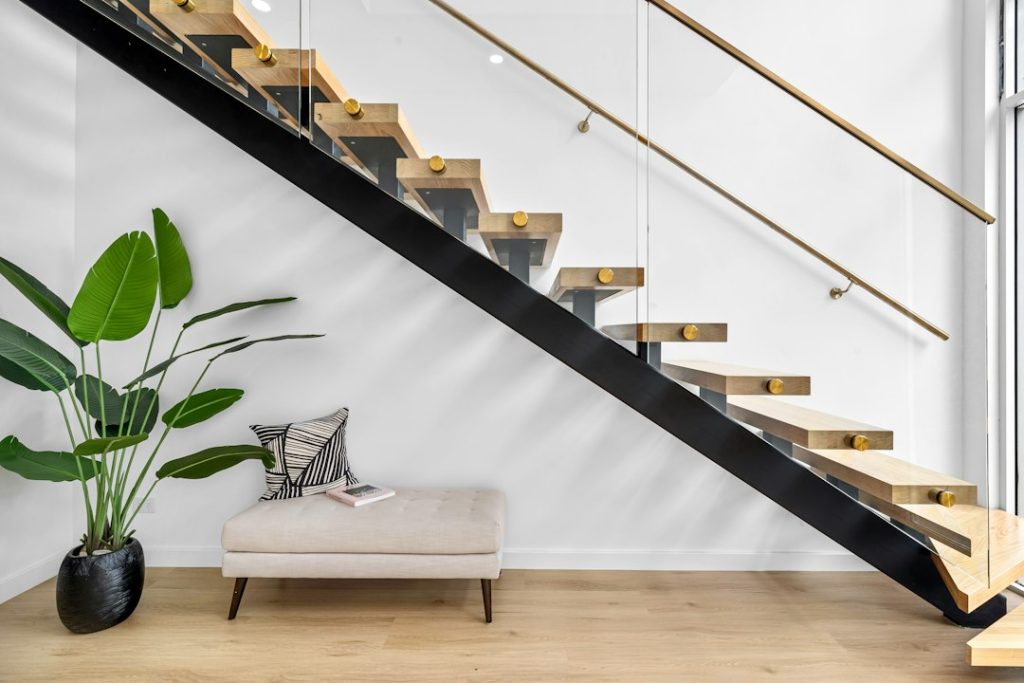 Living room with a staircase and railing