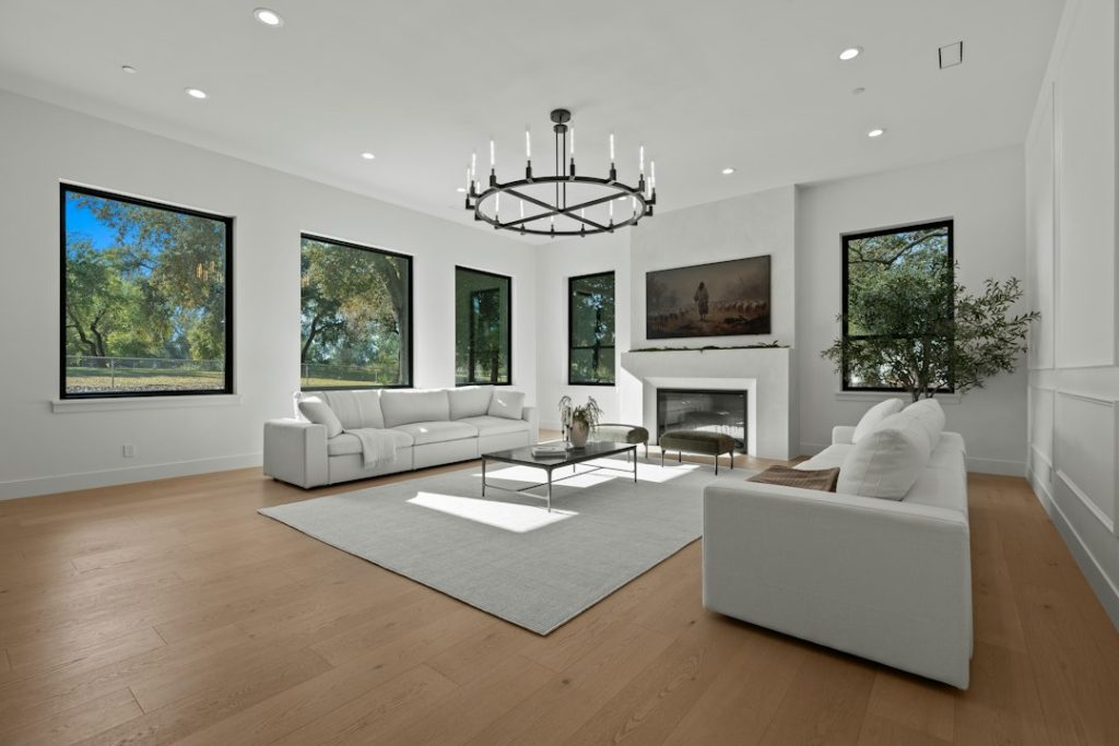 Bright living room with large black-framed windows