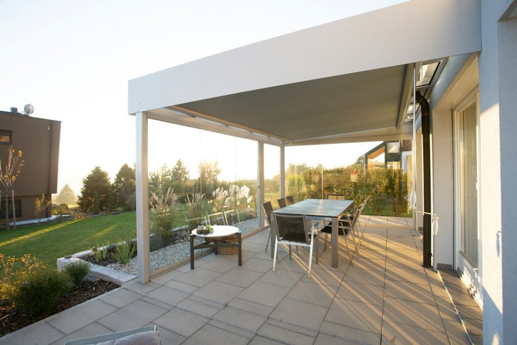 Aluminum patio cover with glass enclosure